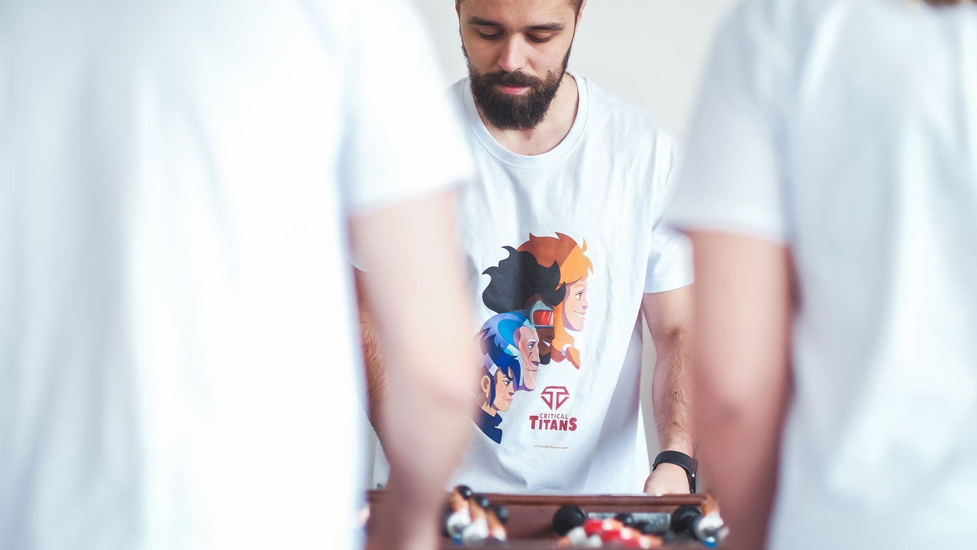 critical software employee playing foosball