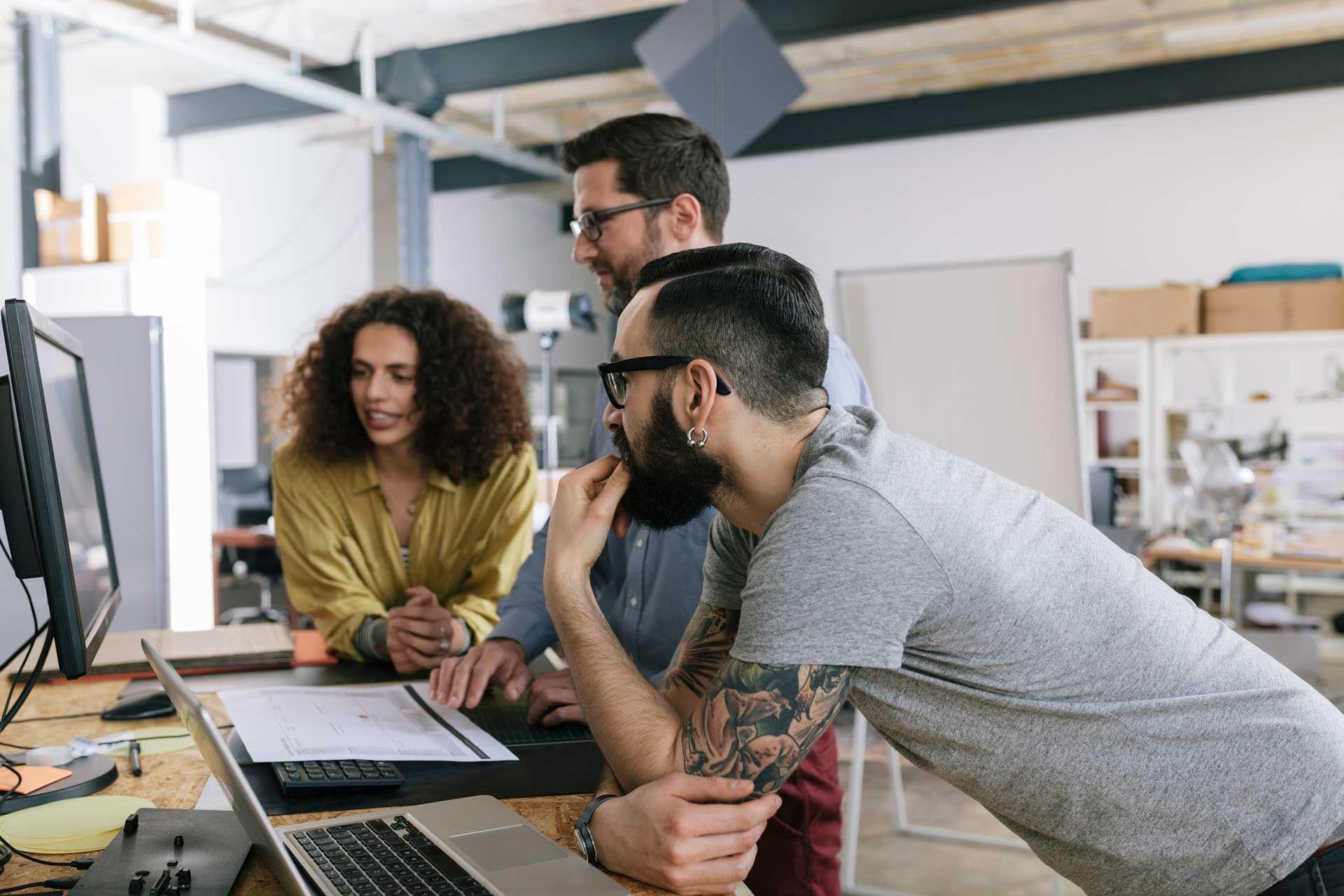 A team of three collaborating on a project