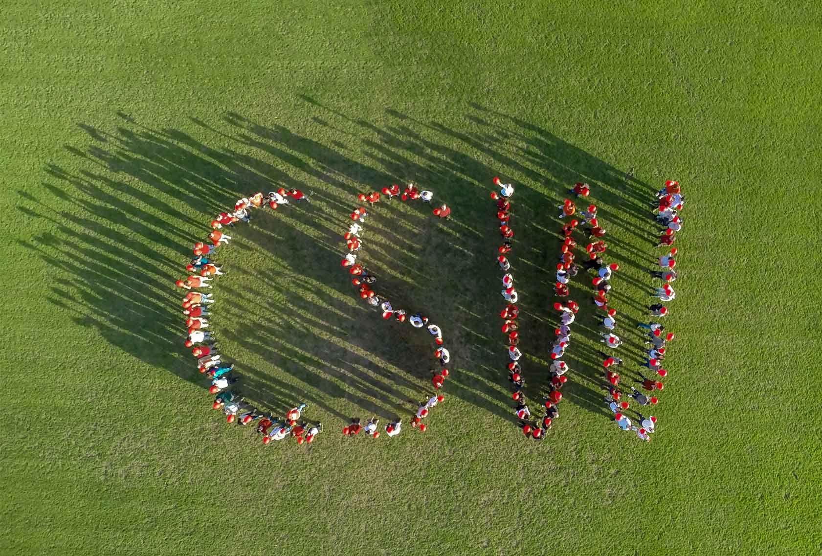 Birds-view shot of Critical Software employees forming CSW 