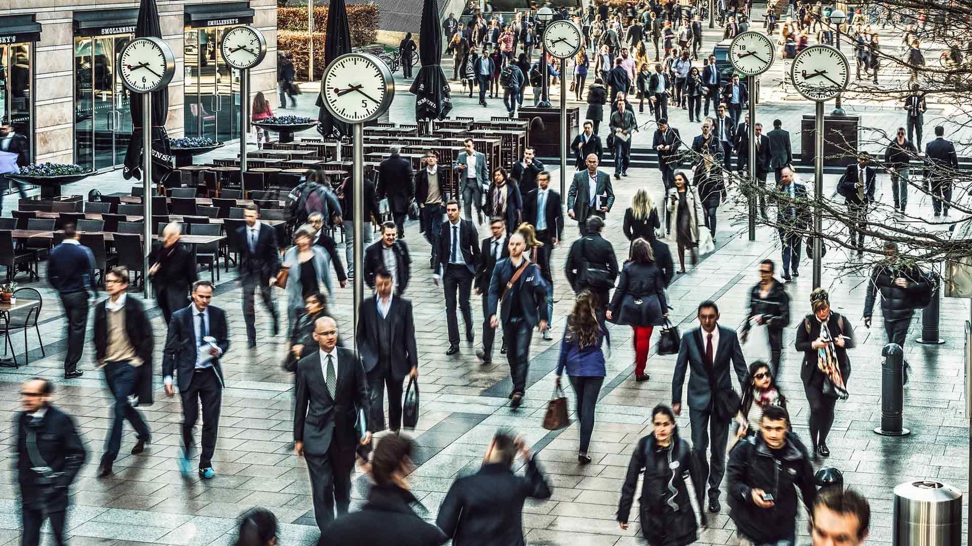 busy street with several clocks