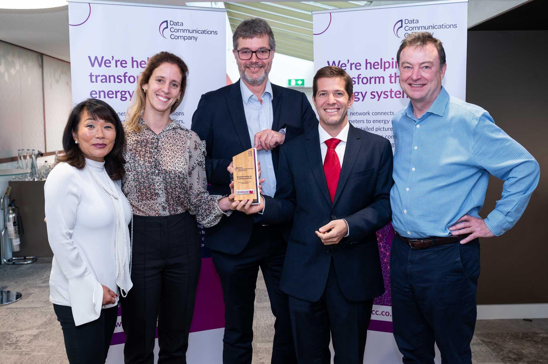 Critical Software employees holding the DCC Partnership Award